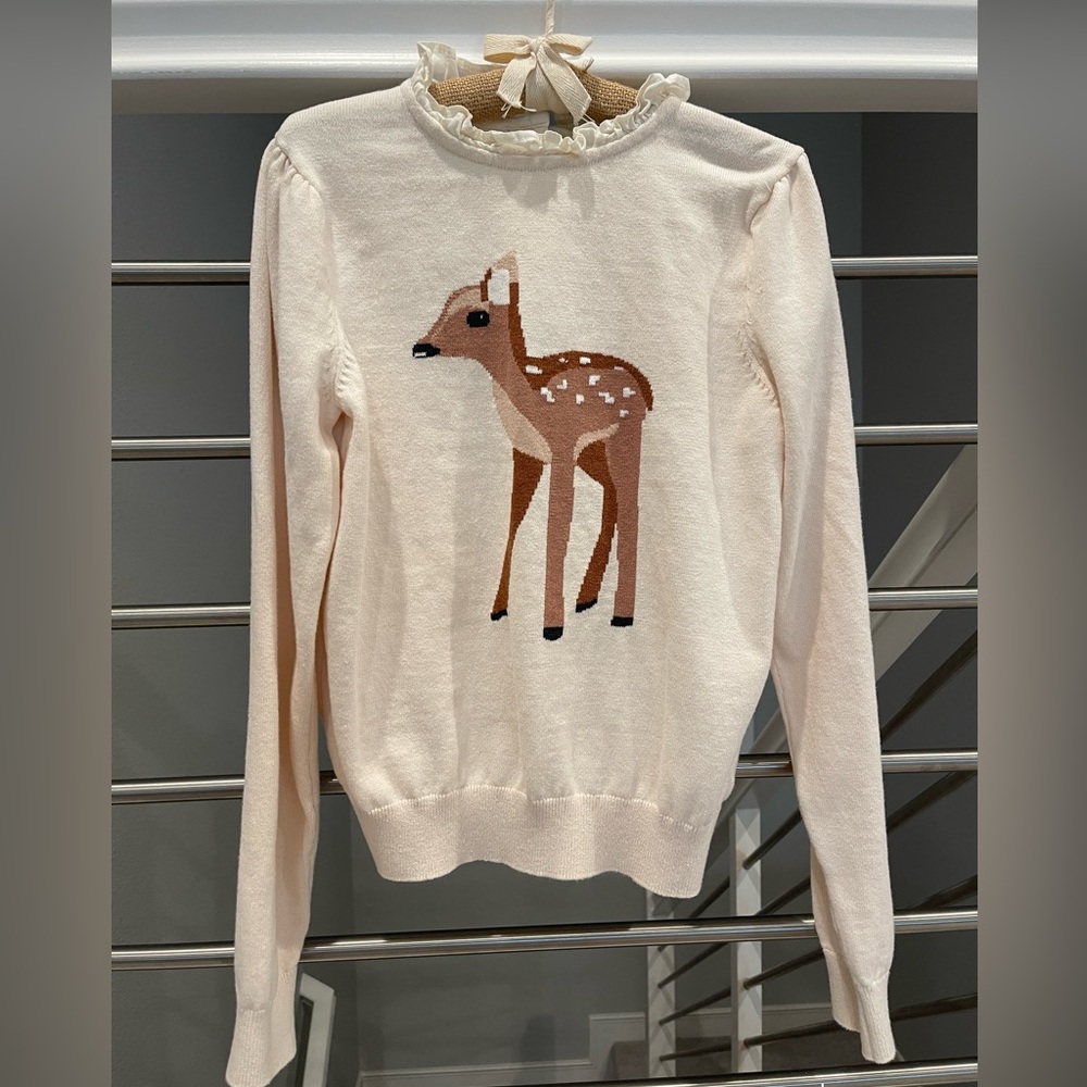 New, never worn. Sweet and cute sweater